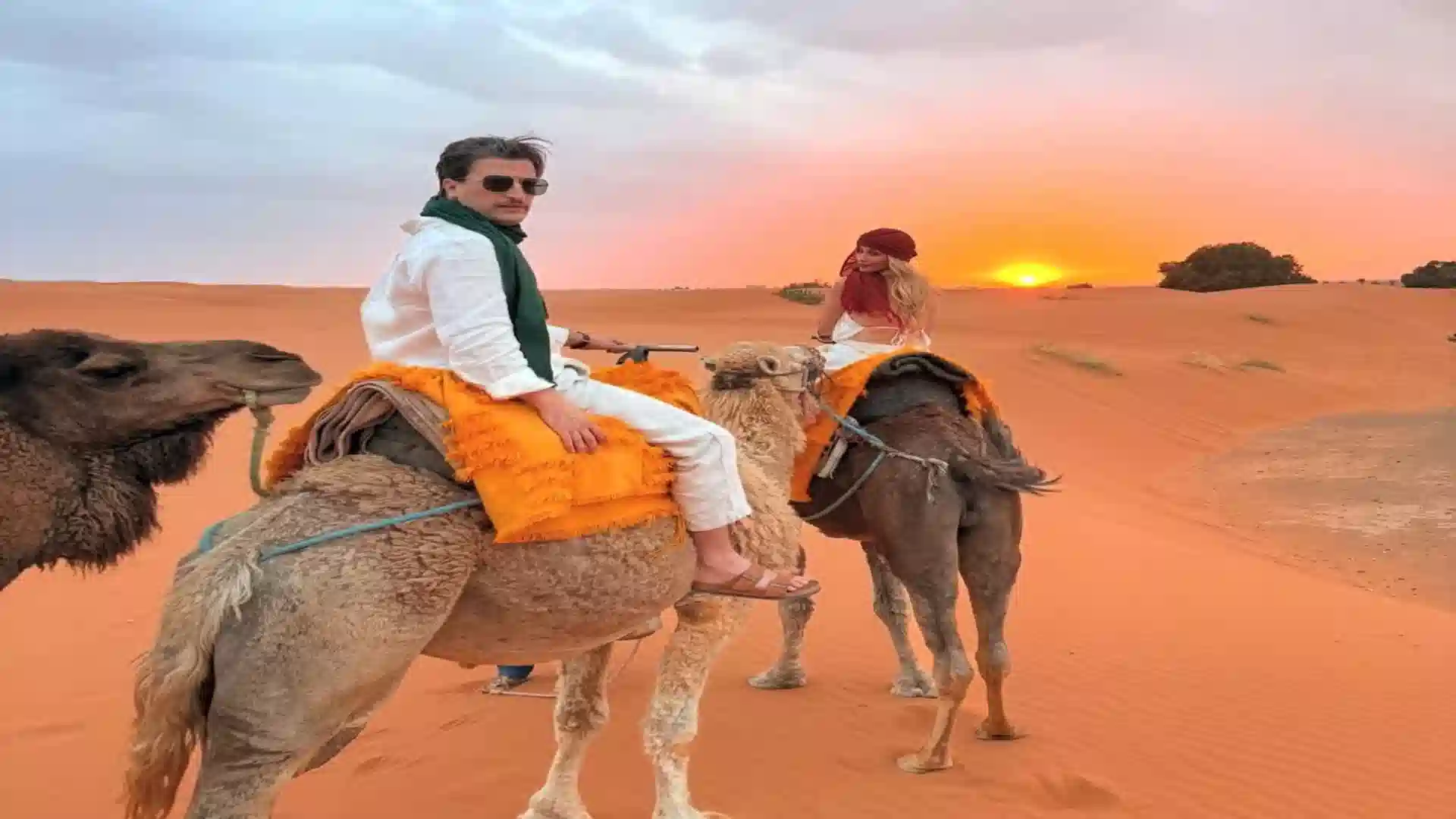 best Morocco tours for Americans - camel trek at sunset in the Erg Chebbi dunes