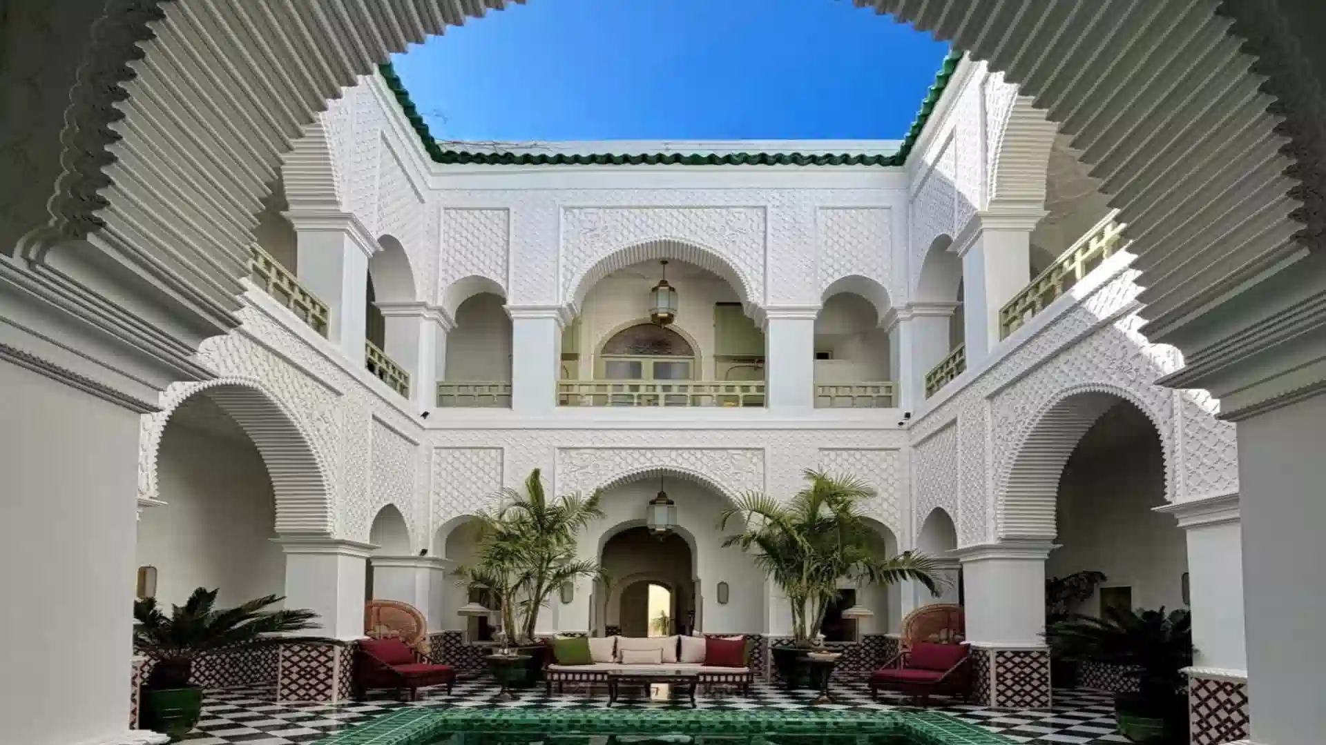 Bahia Palace Marrakech courtyard with carved white stucco plasterwork