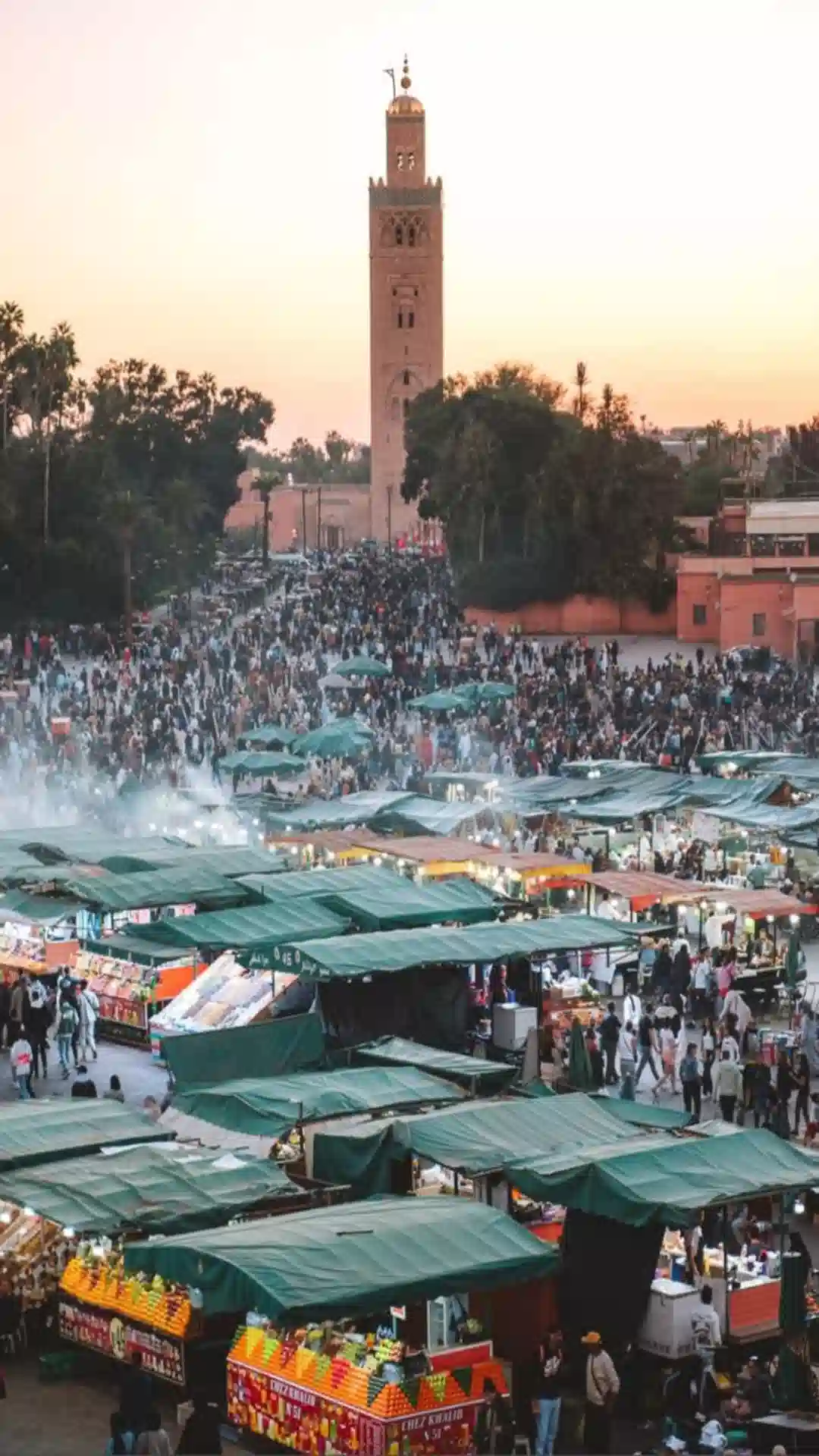 Morocco imperial cities tour - sunset over Jemaa el-Fna square in Marrakech